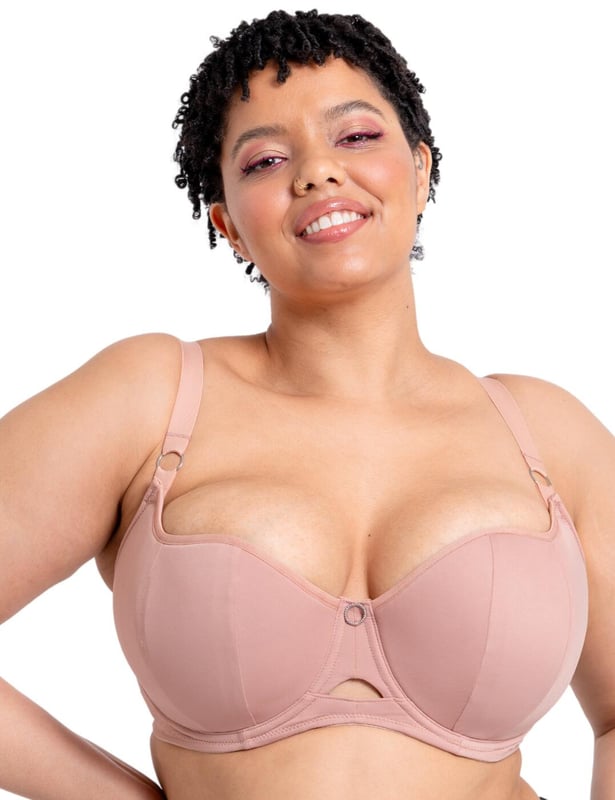 Elevate your essentials this season with the Boost Me Up balcony bra by Curvy Kate. This piece boasts a feminine balcony-style neckline, moulded to allow both support and a beautifully contoured silhouette. With padded, underwired cups; this balcony bra ensures a lifted look that will leave you feeling as good as you look. Mesh back wings provide breathability and the fully adjustable shoulder straps allow for a tailored fit with each wear. Secured at the back with a traditional hook and eye closure for ease of wear.