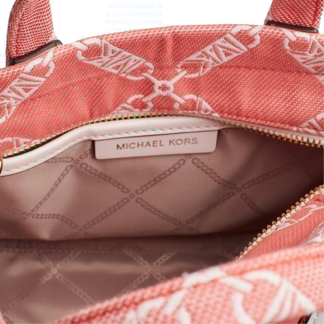 The Gigi crossbody bag will complement almost any look thanks to its neutral logo chain jacquard print. Its compact, rectangular shape is the perfect size for carrying just the essentials and includes a crossbody strap for added versatility.

 Details:
 - Accessory type: Shoulder bag.
 - Material: Textile.
 - Hardware: Gold tone.
 - Interior details: 1 back slip pocket.
 - Exterior details: Front pocket.
 - Adjustable shoulder strap.
 - Closure: Zipper.
 - Includes storage bag.

 Each of Michael Kors' accessories collections features a strong identity, offering a fresh mix of trends, colors, and silhouettes that never go out of style, with urban style and attitude. Each women's shoulder bag designed by Michael Kors is an affordable luxury with a touch of modern, unexpected, and comfortable glamour, offering a piece for every occasion.
 Measures: 25.4 cm x 16.5 cm x 8.25 cm
 Composition: 53.2% Cotton, 46.8% Polyester
 Care:
Clean with a soft, dry cloth.
 Avoid prolonged exposure to the sun and humidity.
 Avoid contact with liquids and rough surfaces.