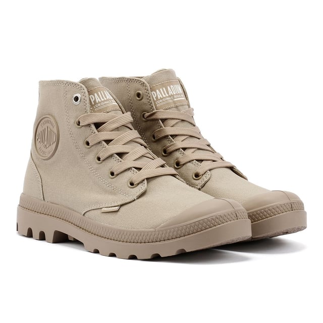 Elevate your streetwear with the athletic version Pampa Hi sneakerboot. Featuring a durable canvas upper in a rugged monochrome colorway, this versatile boot is built for both style and function. Designed for long-lasting comfort, it includes a hard-wearing lugged rubber outsole, a supportive heel cup cradle, and a protective rubber toe cap. Finished with the signature Palladium ankle patch and woven tag for an authentic touch.