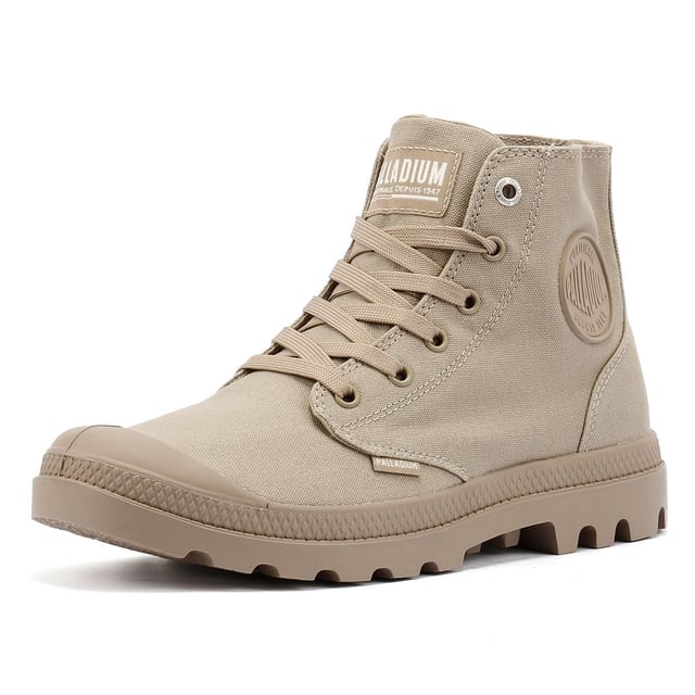 Elevate your streetwear with the athletic version Pampa Hi sneakerboot. Featuring a durable canvas upper in a rugged monochrome colorway, this versatile boot is built for both style and function. Designed for long-lasting comfort, it includes a hard-wearing lugged rubber outsole, a supportive heel cup cradle, and a protective rubber toe cap. Finished with the signature Palladium ankle patch and woven tag for an authentic touch.