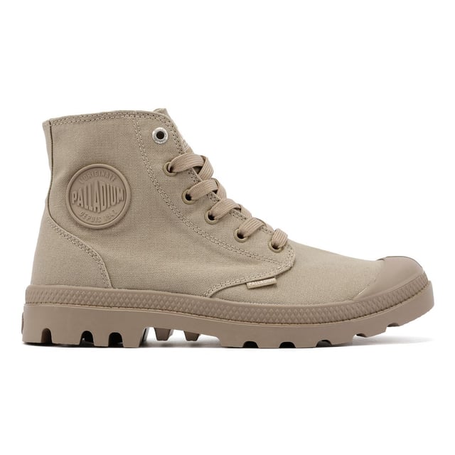 Elevate your streetwear with the athletic version Pampa Hi sneakerboot. Featuring a durable canvas upper in a rugged monochrome colorway, this versatile boot is built for both style and function. Designed for long-lasting comfort, it includes a hard-wearing lugged rubber outsole, a supportive heel cup cradle, and a protective rubber toe cap. Finished with the signature Palladium ankle patch and woven tag for an authentic touch.