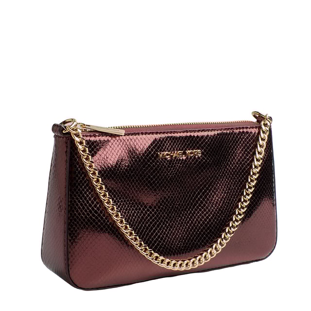 Este exclusivo set de regalo Michael Kors combina elegancia con un sofisticado diseño en piel sintética con textura de serpiente. Incluye un tarjetero compacto, ideal para organizar tarjetas de manera práctica, y un bolso de mano con correa adaptable de bandolera. Ambos cuentan con el distintivo logo Michael Kors, resaltando su diseño refinado y contemporáneo. 

Detalles:
- Material: Piel sintética.
- Textura: De serpiente metalizada.
- Herraje: En tono dorado.
- Bolso: Bolsillo interior frontal abierto, cadena de metal para usar como bolso de mano o de hombro y una correa bandolera ajustable de piel, cierre de cremallera.
- Tarjetero: 3 ranuras para tarjetas, un compartimento transparente para identificación de identidad, bolsillo compacto.
- Presentación en caja, ¡ideal como regalo aniversario, regalo mujer, regalos mujer!

Michael Kors cuenta en cada uno de sus accesorios con una colección de fuerte identidad, ofrece una mezcla fresca de tendencias, colores y siluetas que nunca pasan de moda, con estilo y actitud urbana.
 Medidas: Bolso: 24 cm x 14,3 cm x 6,2 cm; Tarjetero: 10,1 cm x 8,1 cm
 Composición: Ecopiel
 Cuidados:
Limpiar con un paño suave y seco. 
Evitar el contacto con agua y productos abrasivos.