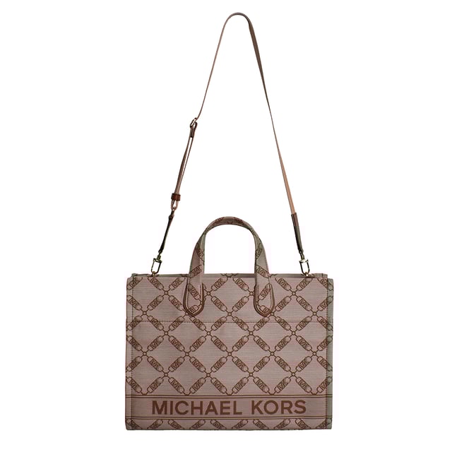 The Michael Kors Gigi tote is the perfect complement to virtually any look thanks to its neutral-toned jacquard chain and logo pattern. The large rectangular silhouette is the perfect size to carry just your everyday essentials and includes a versatile crossbody strap. Inside, there are convenient pockets for your keys and phone.

 Details:
 - Accessory Type: Tote Bag.
 - Material: Synthetic material with the repeated Empire logo.
 - Interior details: Back zipper pocket, 2 front pockets.
 - Exterior details: Front pocket with magnetic closure.
 - Handles: Double.
 - Includes shoulder strap and storage bag.
 - Closure: No closure.

 Each of Michael Kors' accessories collections boasts a strong identity, offering a fresh mix of timeless trends, colors, and silhouettes, combined with urban style and attitude. Each women's tote bag designed by Michael Kors is an affordable luxury with a touch of modern, unexpected, and comfortable glamour, offering a piece for every occasion.
 Measures: 39.4 cm x 29.8 cm x 13.3 cm
 Composition: 53.2% Cotton, 46.8% Polyester
 Care:
Clean with a soft, dry cloth.
 Avoid prolonged exposure to the sun and humidity.
 Avoid contact with liquids and rough surfaces.