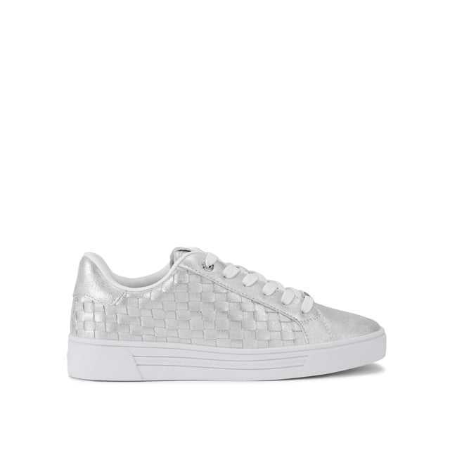 The Carvela Daze Weave trainer features a white upper with woven sides. The hardware is gold with embossed foil logo on the tongue.