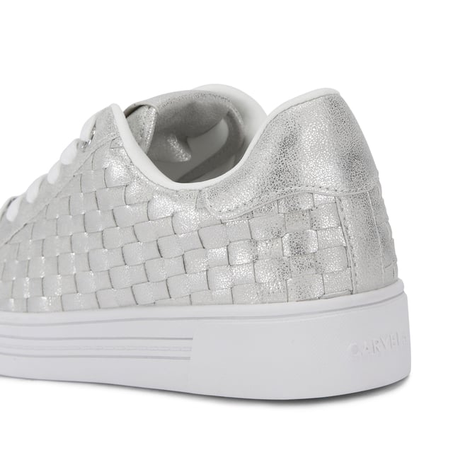 The Carvela Daze Weave trainer features a white upper with woven sides. The hardware is gold with embossed foil logo on the tongue.