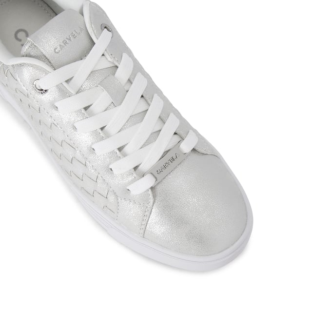 The Carvela Daze Weave trainer features a white upper with woven sides. The hardware is gold with embossed foil logo on the tongue.