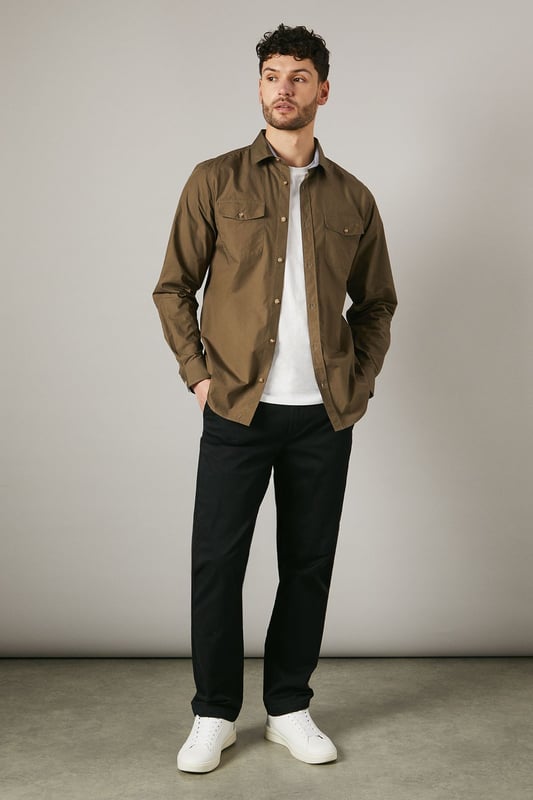 Versatile long sleeve shirt in poplin fabric
        Double chest pockets with button closures
        Classic collar and full-length button placket
        Adjustable cuffs for a customised fit
        Subtle brand detailing on the back yoke
    
    This Maine khaki poplin shirt is a wardrobe essential that seamlessly blends functionality with style. The double chest pockets add a utilitarian touch, perfect for those who appreciate practicality in their attire. Its versatile design makes it suitable for a range of casual occasions, from laid-back weekend brunches to family gatherings. Style it as seen on our model - pair it with dark trousers and white trainers for a smart-casual look that's effortlessly cool. For a more relaxed vibe, leave it unbuttoned over a plain white tee and combine with your favourite jeans. The adjustable cuffs allow you to roll up the sleeves for a more casual appearance or keep them buttoned for a neater finish. This shirt is a true chameleon in your wardrobe, easily dressed up or down to suit your needs, making it an indispensable piece for the modern British man.
