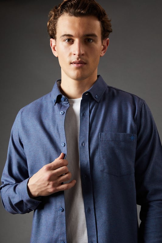 Tri-colour brushed check pattern for visual interest
        Button-down collar for a smart-casual look
        Long sleeves with adjustable cuffs
        Single chest pocket for practicality
        Versatile woven fabric suitable for various occasions
    
    This Maine long sleeve shirt showcases a distinctive tri-colour brushed check pattern, offering a stylish twist on a classic design. The button-down collar adds a touch of refinement, making it suitable for both casual outings and slightly dressier events. For a laid-back weekend look, pair it with olive chinos and white trainers as shown. Alternatively, dress it up for a smart-casual office environment by tucking it into tailored trousers and adding a blazer. The versatile nature of this shirt makes it an excellent choice for family gatherings, pub outings with mates, or casual Fridays at work. Its woven fabric ensures comfort and durability, while the adjustable cuffs allow for a customised fit. Whether worn open over a plain t-shirt or buttoned up with a tie, this Maine shirt is sure to become a staple in your wardrobe.