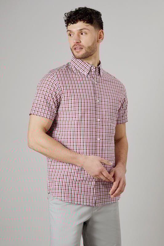Classic button-down collar for a timeless look
        Short sleeves perfect for warmer weather
        Versatile check pattern adds visual interest
        Single chest pocket for a functional touch
        Back pleat for enhanced comfort and movement
    
    This Maine casual check shirt is a wardrobe essential that combines style and comfort effortlessly. The woven fabric ensures a crisp appearance while allowing breathability, making it ideal for various casual occasions. Style it with light grey chino shorts and white trainers for a relaxed weekend look perfect for family gatherings or casual outings. For a smart-casual ensemble, pair it with dark denim jeans and desert boots. The versatile check pattern allows for easy coordination with solid-coloured bottoms, making it a go-to choice for your everyday wardrobe. Whether you're heading to a backyard barbecue or meeting friends for a casual lunch, this shirt will keep you looking sharp and feeling comfortable throughout the day.