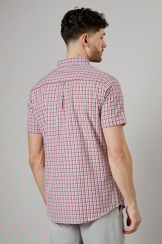 Classic button-down collar for a timeless look
        Short sleeves perfect for warmer weather
        Versatile check pattern adds visual interest
        Single chest pocket for a functional touch
        Back pleat for enhanced comfort and movement
    
    This Maine casual check shirt is a wardrobe essential that combines style and comfort effortlessly. The woven fabric ensures a crisp appearance while allowing breathability, making it ideal for various casual occasions. Style it with light grey chino shorts and white trainers for a relaxed weekend look perfect for family gatherings or casual outings. For a smart-casual ensemble, pair it with dark denim jeans and desert boots. The versatile check pattern allows for easy coordination with solid-coloured bottoms, making it a go-to choice for your everyday wardrobe. Whether you're heading to a backyard barbecue or meeting friends for a casual lunch, this shirt will keep you looking sharp and feeling comfortable throughout the day.