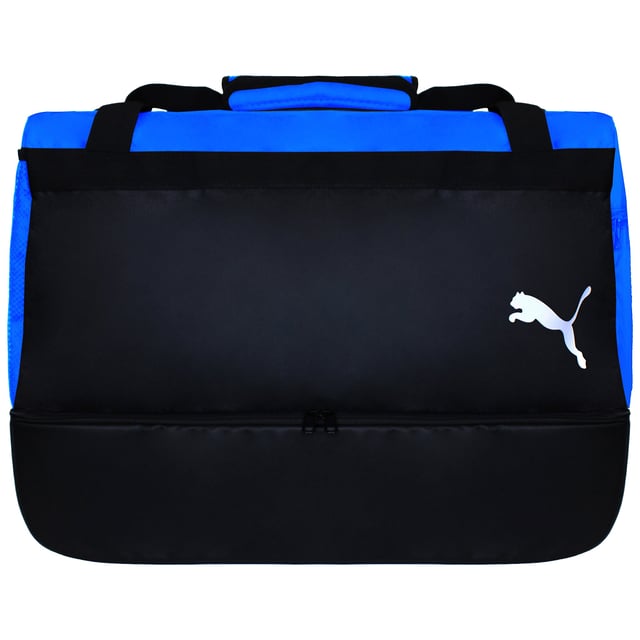 The Puma TeamGoal 23 Black/Blue Hardcase Bag is an excellent choice for athletes who need a reliable and protective bag for their gear. Whether you're heading to a match, training session, or even traveling, this bag is built to keep your equipment safe while offering ample storage space. The hardcase design offers superior protection from bumps and impacts, so you can rest assured that your gear will stay in top condition.
Key Features:
Hardcase Protection: 

The hard shell exterior ensures that your equipment is protected from any rough handling or impacts, which is ideal for transporting delicate or important gear.


Spacious Storage: 

With a generous main compartment, this bag has plenty of space for all your essentials, including clothes, boots, balls, and accessories. There are also additional side pockets to keep smaller items organized.


Durable and Stylish: 

Made from durable materials, this bag is built to withstand wear and tear. The sleek black and blue color combination gives it a modern, sporty look, perfect for any athlete who wants to showcase their style.


Comfortable Carrying: 

The bag is equipped with adjustable shoulder straps and a carry handle, making it easy to carry whether you're rushing to the field or traveling to a tournament.