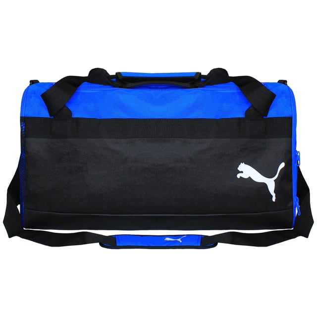 "The Puma 54L TeamGoal 23 Black/Blue Football Bag is designed for athletes who need a spacious and durable bag to carry all their gear. Whether you're heading to the pitch for a game, training, or practice, this football bag offers plenty of room and functionality to keep your essentials organized and easily accessible. With its sleek black and blue color scheme and high-performance features, it's the ideal companion for your sporting activities.
Key Features:
Large Capacity (54L): 

With a generous 54-liter capacity, this bag offers plenty of space to store your football gear, clothing, shoes, water bottle, and more. It's large enough to hold all your essentials without being overly bulky.


Durable &amp; High-Quality Material: 

Made with durable, water-resistant materials, this bag is built to withstand the rigors of sports activities, ensuring it lasts through multiple seasons of use.


Multiple Pockets: 

Equipped with multiple compartments, including a large main compartment, side zip pockets, and a front pocket, the bag offers easy organization of your gear, allowing you to separate your clean clothes from your dirty ones or keep smaller items secure.


Adjustable Shoulder Straps: 

The adjustable shoulder straps with padding allow for a comfortable, customizable fit, ensuring you can carry the bag with ease and comfort, even when it's full.