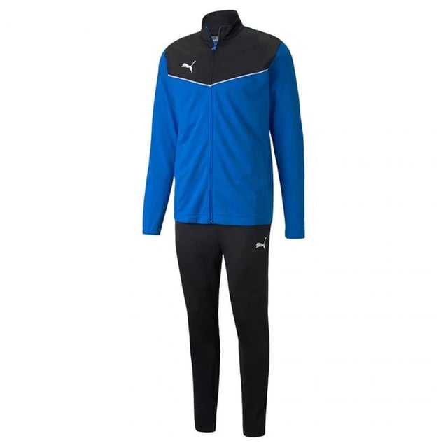 Der schwarz/blaue Trainingsanzug von Puma IndividualRise für Herren vereint Stil, Komfort und Leistung in einem eleganten und modernen Paket. Dieser Trainingsanzug wurde für Sportler und alle, die Hochleistungsausrüstung zu schätzen wissen, entwickelt und bietet die perfekte Mischung aus Funktionalität und Mode. Die kräftige schwarz-blaue Farbgebung setzt ein Statement, während die Materialien und die Passform des Trainingsanzugs dafür sorgen, dass Sie den ganzen Tag über bequem und beweglich bleiben, egal ob Sie trainieren, reisen oder einfach nur entspannen. Hauptmerkmale: Stylisches schwarz-blaues Design: Mit seinem kräftigen schwarz-blauen Farbschema strahlt dieser Trainingsanzug Selbstvertrauen und Modernität aus. Die Kontrastfarben verleihen einen sportlichen und dynamischen Look und machen ihn perfekt für die Freizeit sowie den Sport. Bequemes und leichtes Material: Dieser Trainingsanzug aus atmungsaktivem, leichtem Material bietet maximalen Komfort. Er leitet Schweiß ab und sorgt dafür, dass Sie bei intensiven Trainingseinheiten oder langen Tagen unterwegs kühl, trocken und komfortabel bleiben. Jacke mit durchgehendem Reißverschluss: Die Jacke mit durchgehendem Reißverschluss ermöglicht einfaches An- und Ausziehen und bietet gleichzeitig eine einstellbare Belüftung. Das Reißverschlussdesign ermöglicht es Ihnen, den Schutz individuell anzupassen, egal ob Sie mehrere Schichten Kleidung zum Wärmen oder zum Abkühlen nach dem Training tragen. Elastischer Bund und Bündchen: Der elastische Bund und die Bündchen an Jacke und Hose sorgen für einen bequemen, sicheren Sitz und verhindern so unangenehme Bewegungen und Ablenkungen. Dieses Design verbessert die Passform und Funktionalität des Trainingsanzugs.