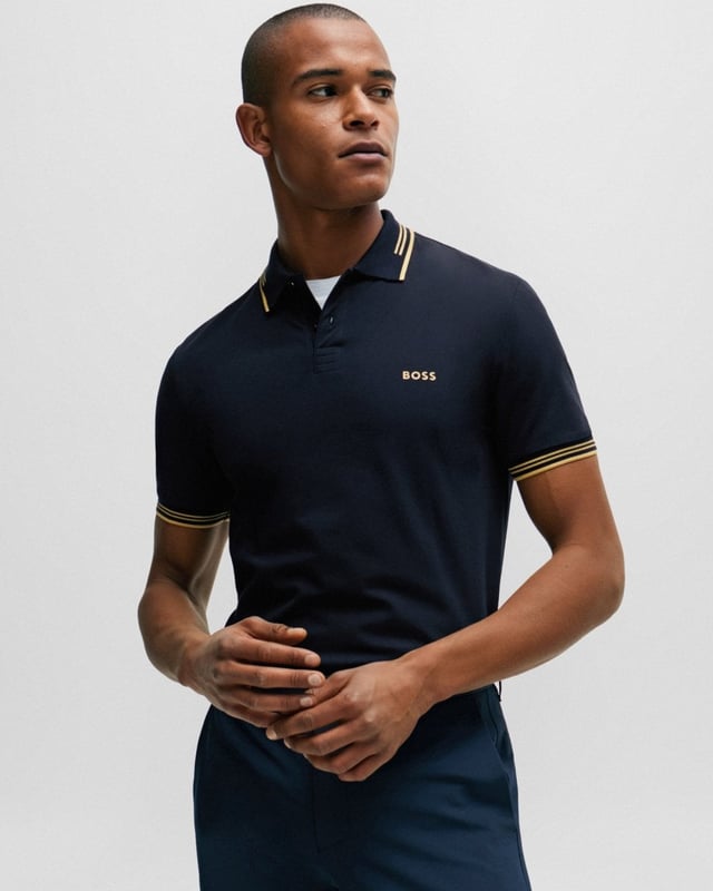 A contemporary polo shirt cut to a defined fit by BOSS Menswear, created in stretch cotton with contrast stripes and branding.

Slim fit
Flat-knit collar
Number of buttons: 2
Short sleeves
Flat-knit cuffs
Standard length
92% Cotton, 8% Elastane

50506193