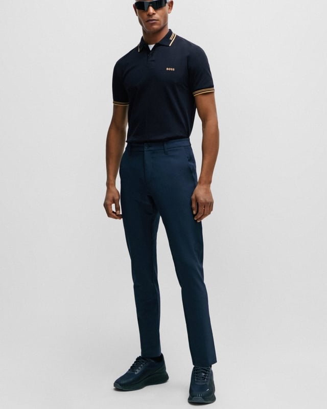 A contemporary polo shirt cut to a defined fit by BOSS Menswear, created in stretch cotton with contrast stripes and branding.

Slim fit
Flat-knit collar
Number of buttons: 2
Short sleeves
Flat-knit cuffs
Standard length
92% Cotton, 8% Elastane

50506193