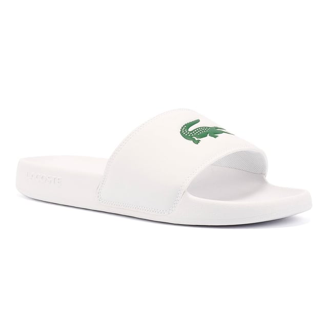 Slides featuring a smooth, rubberized upper for a sleek finish. Wide strap with bold logo detailing. Lightweight and durable design for all-day comfort.