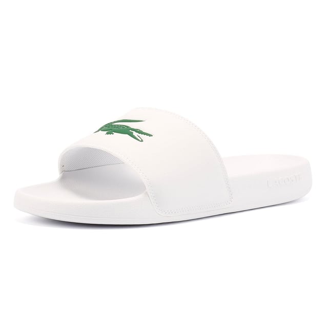 Slides featuring a smooth, rubberized upper for a sleek finish. Wide strap with bold logo detailing. Lightweight and durable design for all-day comfort.