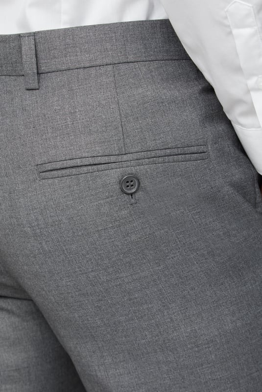 Formal Suit Trousers by Occassions. This stylish, grey slim-fit pair of suit trousers from the Occasions range boasts modern comfort and practicality. A perfect addition to a formal wardrobe for weddings and special events. Pair with the matching jacket for the full look.