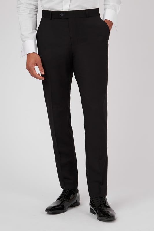 Slim Fit Curtis Twill Trouser by Antique Rogue. Get ready for an occasion to remember with this party-perfect dress trousers from Antique Rogue. Pair with the matching jacket, a crisp white dress shirt and bow tie for the ultimate party season suit. Contemporary design meets heritage influence with Antique Rogue. Designed for the true trendsetter, an eye-catching colour palette spans across checked fabrics, bright plaids, and textures that elevate suits, shirts, and more. Antique Rogue's unique suits combine legendary British tailoring with distinctive styling, coming together to create a timeless range that can be dressed up or down.