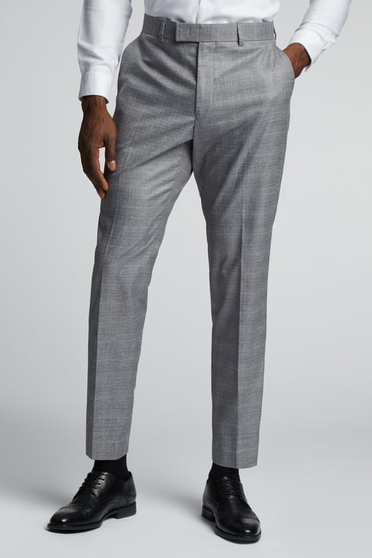 Contemporary design meets heritage influence with Antique Rogue. Designed for the true trendsetter, an eye-catching colour palette spans across checked fabrics, bright plaids, and textures that elevate suits, shirts, and more. Antique Rogue's unique suits combine legendary British tailoring with distinctive styling, coming together to create a timeless range that can be dressed up or down.