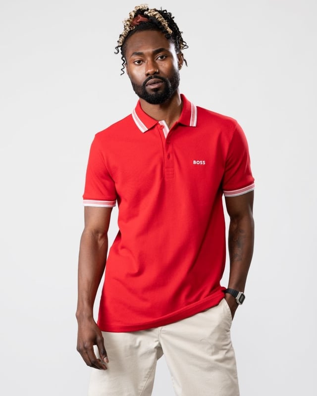 A signature polo shirt by BOSS Menswear, cut to a regular fit. Featuring contrast tipping and a logo at the left chest, this short-sleeved polo shirt is designed in cotton piqué and detailed with further BOSS branding at the undercollar.

Regular fit
Flat-knit collar
Number of buttons: 3
Short sleeves
Flat-knit cuffs
Standard length
100% Cotton

 
50469055
