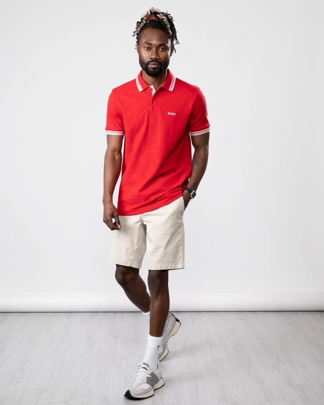 A signature polo shirt by BOSS Menswear, cut to a regular fit. Featuring contrast tipping and a logo at the left chest, this short-sleeved polo shirt is designed in cotton piqué and detailed with further BOSS branding at the undercollar.

Regular fit
Flat-knit collar
Number of buttons: 3
Short sleeves
Flat-knit cuffs
Standard length
100% Cotton

 
50469055