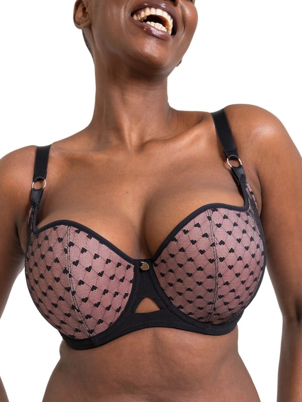 Curvy Kate Boost Heartbreaker Padded Balcony Bra. Padded underwired bra with a sweetheart neckline, uplifting vertical moulded cups and a heart print mesh overlay. The product is recommended for hand wash only.
