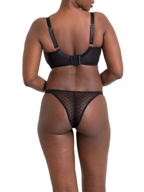 Curvy Kate Boost Heartbreaker Padded Balcony Bra. Padded underwired bra with a sweetheart neckline, uplifting vertical moulded cups and a heart print mesh overlay. The product is recommended for hand wash only.