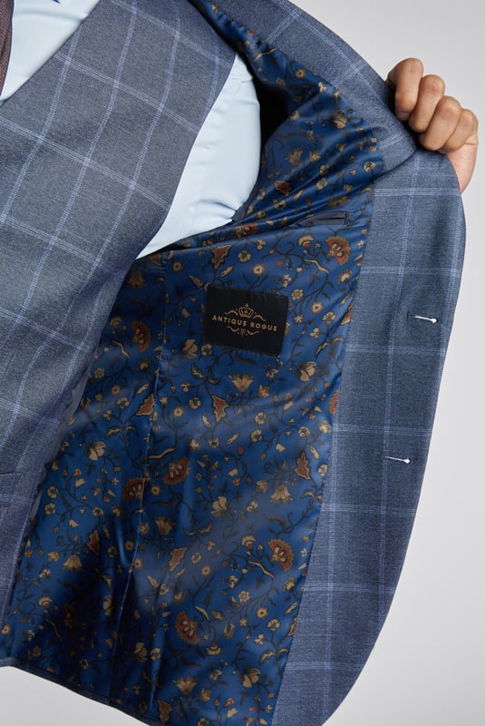 Contemporary design meets heritage influence with Antique Rogue. Designed for the true trendsetter, an eye-catching colour palette spans across checked fabrics, bright plaids, and textures that elevate suits, shirts, and more. Antique Rogue's unique suits combine legendary British tailoring with distinctive styling, coming together to create a timeless range that can be dressed up or down.