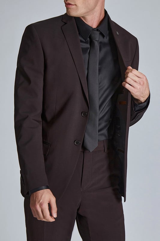 Make a statement at your next event with Ted Baker''s burgundy suit jacket. Cut in a slim fit for a contemporary feel, then finished with Ted''s signature magnolia lining and lapel pin. Pair this with the matching suit trouser.