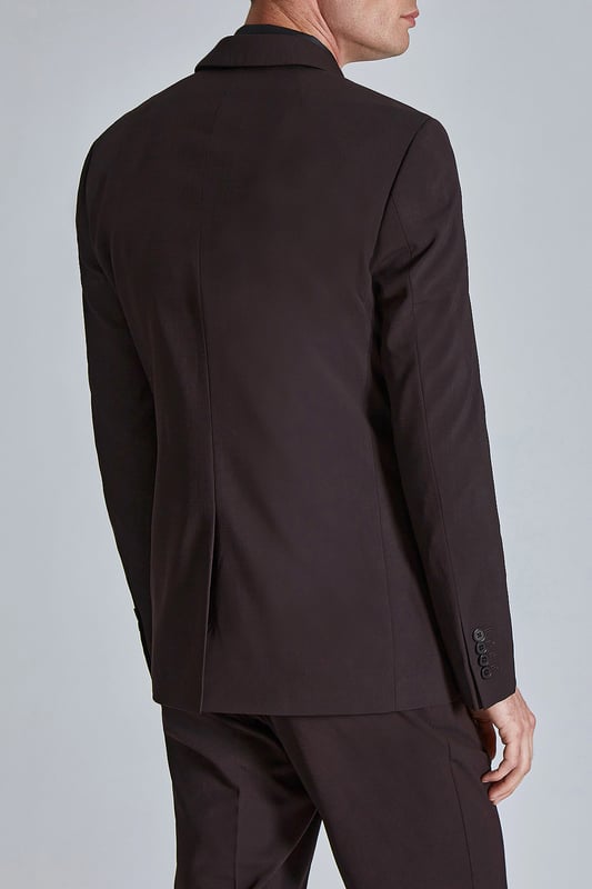 Make a statement at your next event with Ted Baker''s burgundy suit jacket. Cut in a slim fit for a contemporary feel, then finished with Ted''s signature magnolia lining and lapel pin. Pair this with the matching suit trouser.
