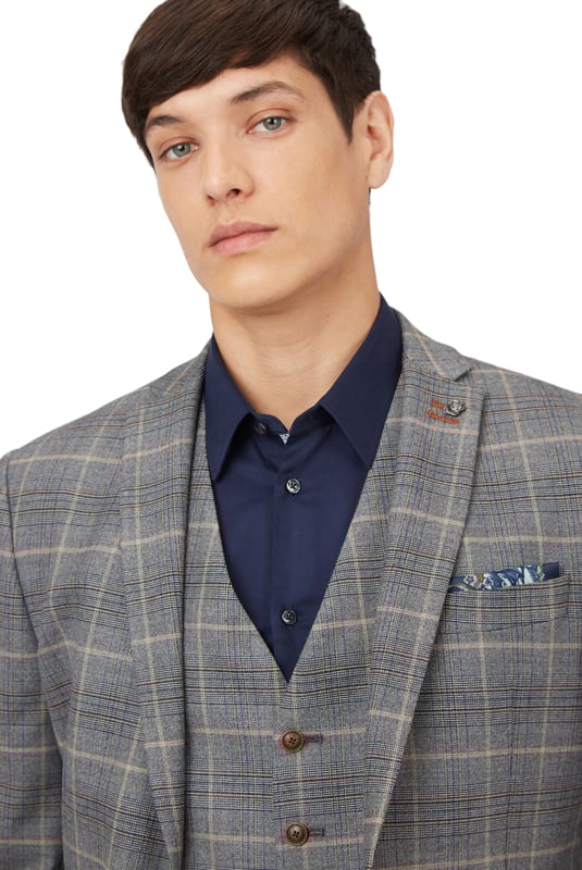 Check Jacket by Antique Rogue. Single breasted two button front slim fit jacket with a notch lapel and three button cuff. Style with matching trouser and waistcoat.