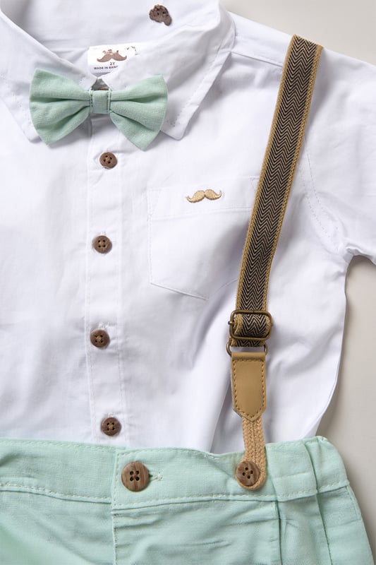 Dress your little one to impress with this delightful set from Little Gent. Featuring a shirt, bowtie, and shorts with attached braces. Perfect for special occasions or stylish outings, your little one will look effortlessly dapper and be ready to steal the spotlight!