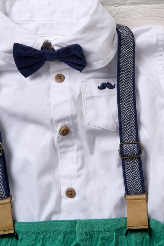 Dress your little one to impress with this delightful set from Little Gent. Featuring a shirt, bowtie, and shorts with attached braces. Perfect for special occasions or stylish outings, your little one will look effortlessly dapper and be ready to steal the spotlight!