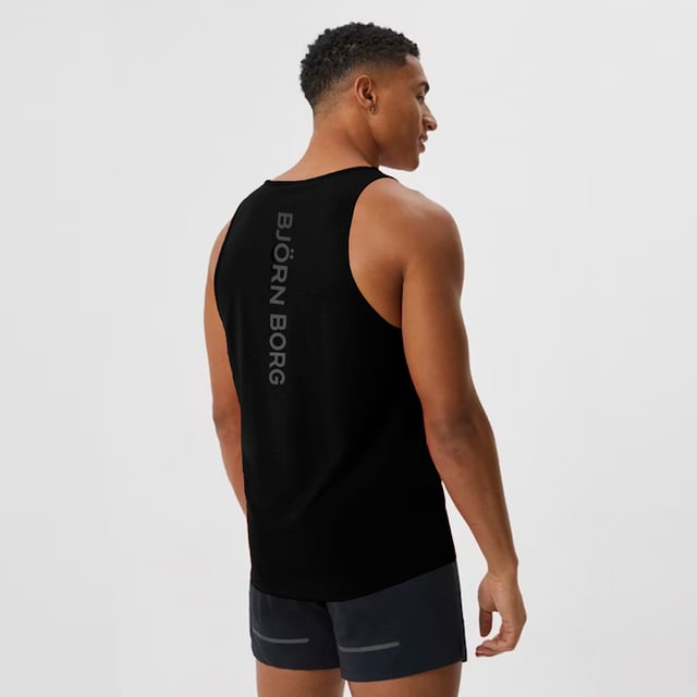 Borg Running Perforated Tank - Breathable and Lightweight Performance: Elevate your running gear with the Björn Borg Borg Running Perforated Tank, designed for athletes who value breathability and comfort. Made from lightweight, recycled polyester, this tank top features perforated fabric for enhanced ventilation, keeping you cool during intense workouts. It offers a regular fit and is perfect for warmer weather or layering. Extra Product Details:. 100% Recycled Polyester Regular Fit Perforated Fabric for breathability Round Neckline Machine Washable. This tank is a must-have for runners looking for a combination of style and performance in their gear.