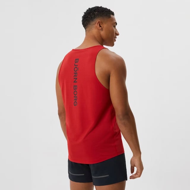 Borg Running Perforated Tank - Breathable and Lightweight Performance: Elevate your running gear with the Björn Borg Borg Running Perforated Tank, designed for athletes who value breathability and comfort. Made from lightweight, recycled polyester, this tank top features perforated fabric for enhanced ventilation, keeping you cool during intense workouts. It offers a regular fit and is perfect for warmer weather or layering. Extra Product Details:. 100% Recycled Polyester Regular Fit Perforated Fabric for breathability Round Neckline Machine Washable. This tank is a must-have for runners looking for a combination of style and performance in their gear.