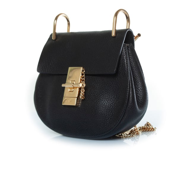 VINTAGE, RRP AS NEW
Chloe, black leather drew bag. The item is in very good condition. 
 CONDITION: very good condition

SIZE: small

MEASUREMENTS: height 17 cm, width 19 cm, depth cm, height handle 6 cm, length strap 106 cm

MATERIAL: grained leather

CARE: specialist leather treatment

COLOR: black, gold Measurments:  width: 190 mm height: 170 mm strap length: 1060 mm
