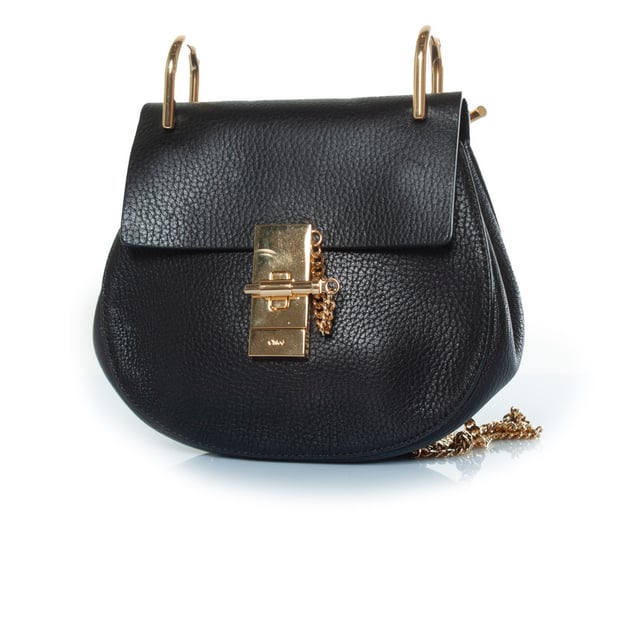 VINTAGE, RRP AS NEW
Chloe, black leather drew bag. The item is in very good condition. 
 CONDITION: very good condition

SIZE: small

MEASUREMENTS: height 17 cm, width 19 cm, depth cm, height handle 6 cm, length strap 106 cm

MATERIAL: grained leather

CARE: specialist leather treatment

COLOR: black, gold Measurments:  width: 190 mm height: 170 mm strap length: 1060 mm