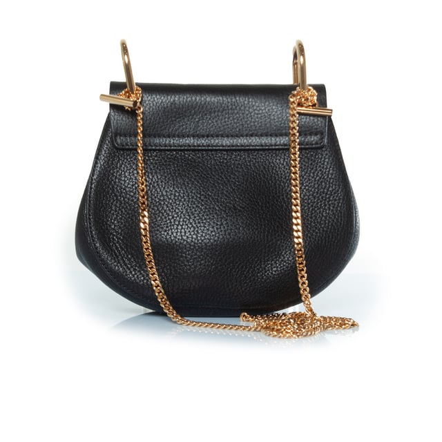 VINTAGE, RRP AS NEW
Chloe, black leather drew bag. The item is in very good condition. 
 CONDITION: very good condition

SIZE: small

MEASUREMENTS: height 17 cm, width 19 cm, depth cm, height handle 6 cm, length strap 106 cm

MATERIAL: grained leather

CARE: specialist leather treatment

COLOR: black, gold Measurments:  width: 190 mm height: 170 mm strap length: 1060 mm