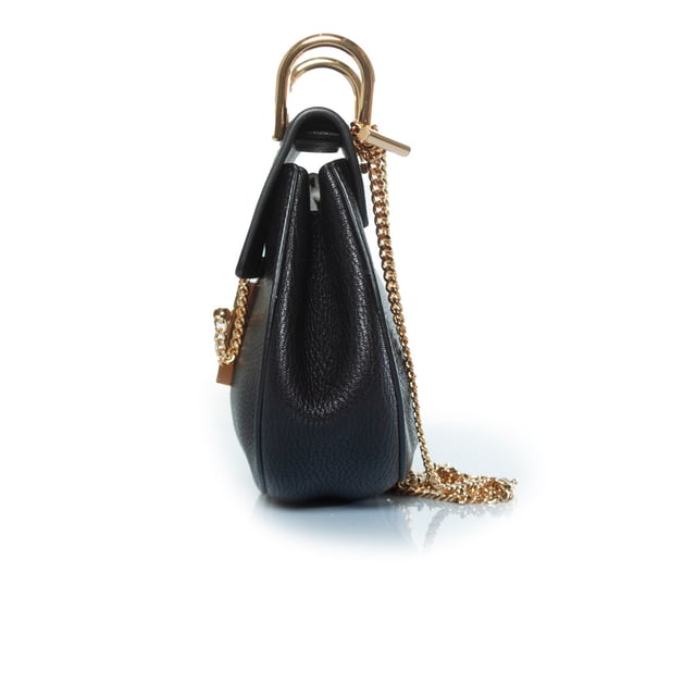 VINTAGE, RRP AS NEW
Chloe, black leather drew bag. The item is in very good condition. 
 CONDITION: very good condition

SIZE: small

MEASUREMENTS: height 17 cm, width 19 cm, depth cm, height handle 6 cm, length strap 106 cm

MATERIAL: grained leather

CARE: specialist leather treatment

COLOR: black, gold Measurments:  width: 190 mm height: 170 mm strap length: 1060 mm