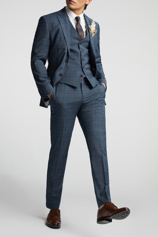 A classic recapture of British tailoring - Alexandre of England present the Blue Soft Check tailored fit suit jacket. Made in a luxurious wool blend with added stretch, for guaranteed comfort and style for any occasion.With a single-breasted, two button fastening, this jacket also features notch lapels, 2 straight flap pockets and tonal printed lining for added impact.