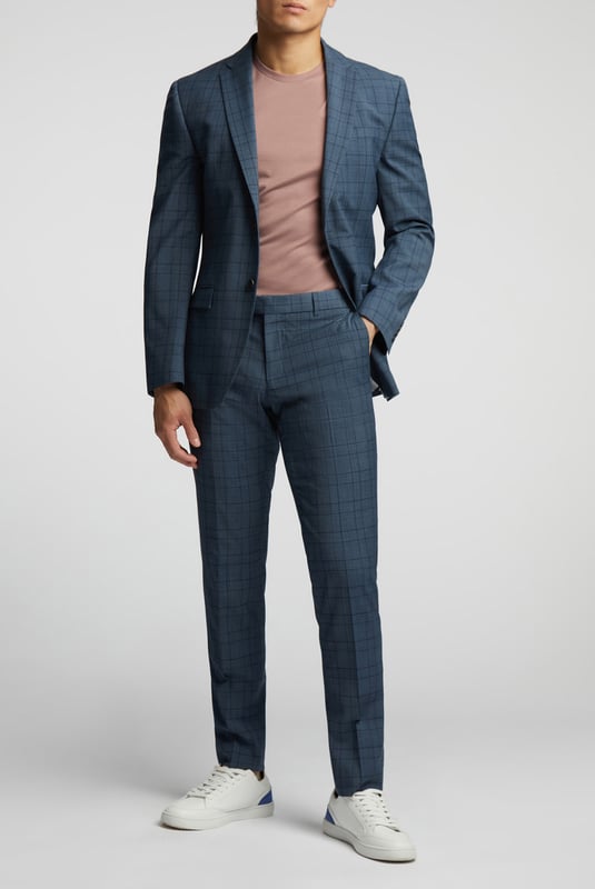 A classic recapture of British tailoring - Alexandre of England present the Blue Soft Check tailored fit suit jacket. Made in a luxurious wool blend with added stretch, for guaranteed comfort and style for any occasion.With a single-breasted, two button fastening, this jacket also features notch lapels, 2 straight flap pockets and tonal printed lining for added impact.