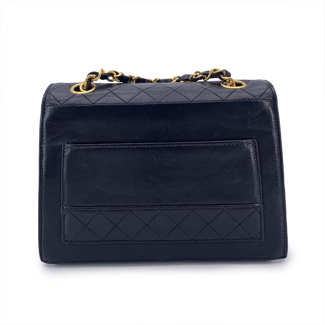 VINTAGE, RRP AS NEW
Vintage Chanel crossbody bag in black leather with Quilted leather trim. Structured design. Period/Era: 1989-1991. Flap with CC turn lock closure. Burgundy leather lining. 1 side pocket with button closure internally. Leather quilted shoulder strap. 1 rear open pocket. 4 bottom feet. 'CHANEL' and 'Made in france' embossed inside. ity hologram tag inside  Condition Rating: B - VERY GOOD CONDITIONCondition Details: Some scratches on leather due to normal use. Some scratches on leather internally. Some wear of use on bottom corners.Please, see the photos and/or ask if you have any doubts or if you need more information.Measurements (cm):Depth: 6.4Height: 14.0Length: 20.3Other Details: Dustbag? NoKeys? NoBox? No Measurments:  width: 64 mm length: 203 mm height: 140 mm