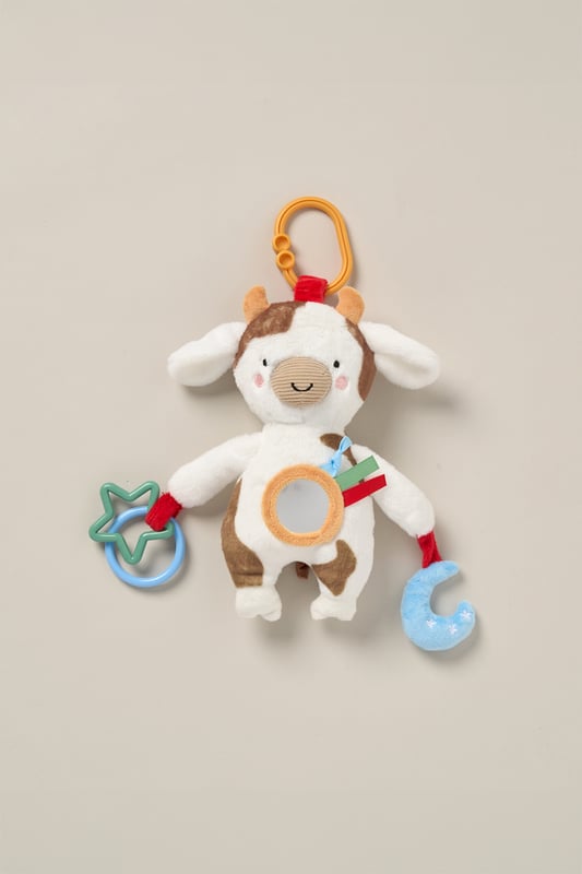 This adorable nursery activity toy from the Lily & Jack collection is designed to entertain and stimulate babies. It features a unique, colourful design with engaging textures, sounds, and interactive elements to encourage sensory exploration and motor skill development. Includes a clip for easy attaching.