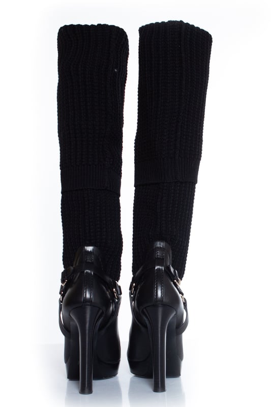 VINTAGE, RRP AS NEW
Gucci, Black over knee sock boots. The item is in good condition and comes with box and dustbag.
 • CONDITION: good condition 

• SIZE: 39.5

• INSOLE MEASUREMENTS: 25.5 cm

• HEEL MEASUREMENTS: 12 cm PLATFORM: 2.5 cm

• SHAFT HEIGHT: 60 cm WIDTH TOP: 9 cm (stretch)

• FABRIC: leather, wool 

• COLOUR: black