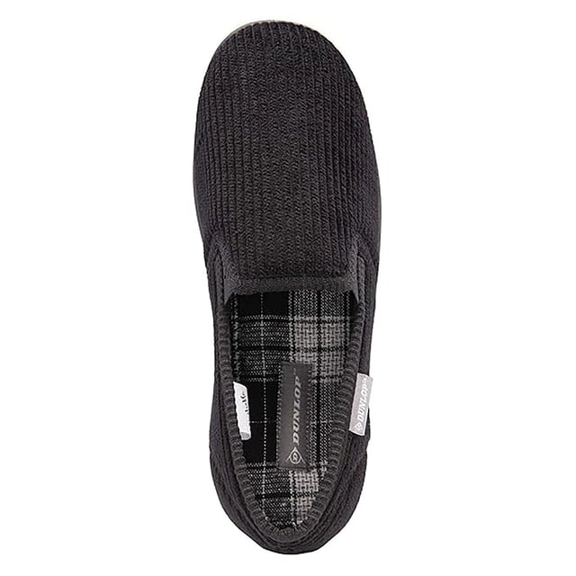 Dunlop - Men’s Tartan Lined Slippers With Memory Foam: Introducing Dunlop Men’s Tartan Lined Slippers. A perfect blend of style, comfort, and durability. These men's slippers feature a classic tartan print lining, providing a touch of sophistication to your loungewear. The memory foam padding ensures an exceptionally comfortable experience, creating a soft and supportive buffer between your feet and the floor. The cushioned insole provides an extra layer of comfort, making these slippers supremely soft for your relaxation. Designed with a hard-wearing traction rubber sole, these slippers offer increased comfort and protection. The Dunlop brand has an enviable reputation which extends to its slipper and casual footwear range. Offering the consumer a creative and inspired range of footwear with emphasis being placed on creative trims, innovative fabrics and outstanding comfort. Made from 100% Textile Upper with a rubber sole, there are 5 colours: Black, Navy, Brown, Burgundy & Charcoal. The slippers are available in sizes 7-12 UK. They are hand wash or a low temperature machine wash. Extra Product Details: Dunlop Men’s Slippers Tartan Print Lining Memory Foam Padding Hard Traction Rubber Sole Soft & Comfortable Dunlop Branded Available From Sizes 7-11 UK 5 Colour Options Machine Washable