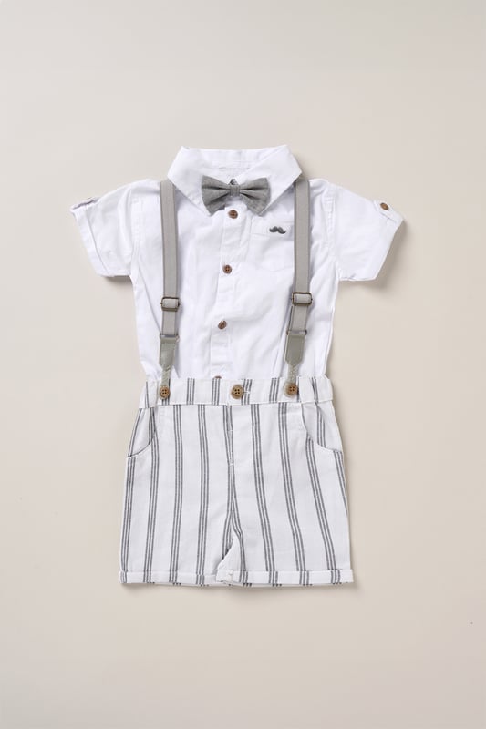 Dress your little one to impress with this delightful set from Little Gent. Featuring a shirt bodysuit, bowtie, and shorts with attached braces. Perfect for special occasions or stylish outings, your little one will look effortlessly dapper and be ready to steal the spotlight!