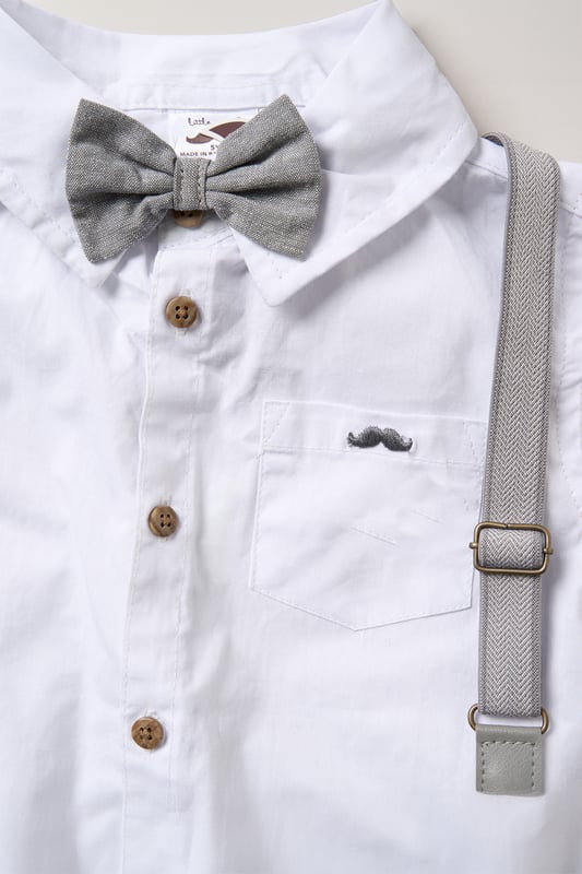 Dress your little one to impress with this delightful set from Little Gent. Featuring a shirt bodysuit, bowtie, and shorts with attached braces. Perfect for special occasions or stylish outings, your little one will look effortlessly dapper and be ready to steal the spotlight!