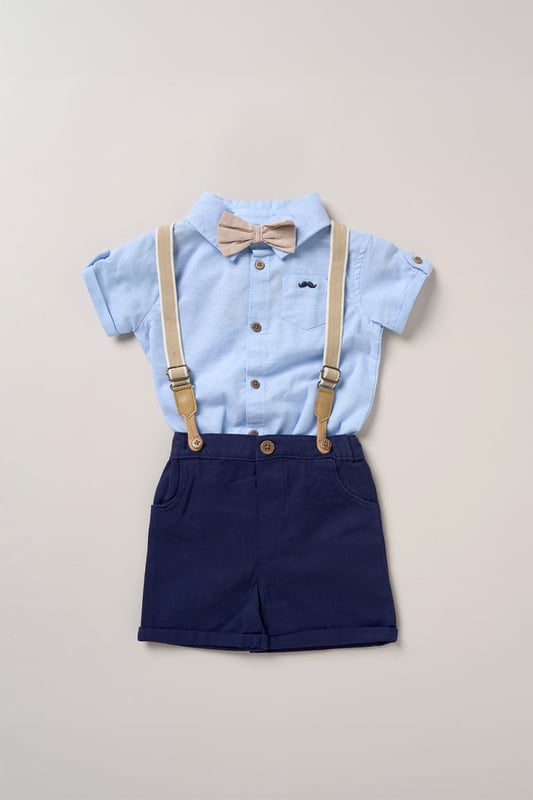 Bodysuit Shirt, Shorts and Braces Outfit Set Dress your little one to impress with this delightful set from Little Gent. Featuring a shirt bodysuit, bowtie, and shorts with attached braces. Perfect for special occasions or stylish outings, your little one will look effortlessly dapper and be ready to steal the spotlight!