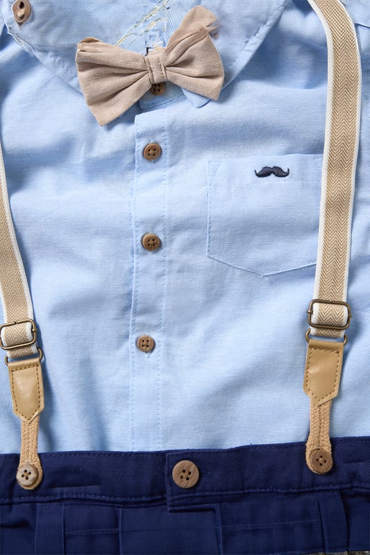 Bodysuit Shirt, Shorts and Braces Outfit Set Dress your little one to impress with this delightful set from Little Gent. Featuring a shirt bodysuit, bowtie, and shorts with attached braces. Perfect for special occasions or stylish outings, your little one will look effortlessly dapper and be ready to steal the spotlight!